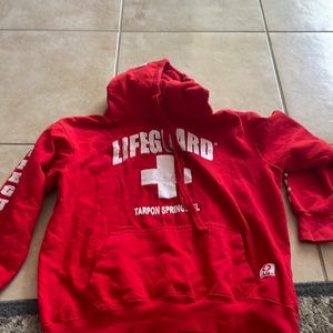 red lifeguard sweatshirt